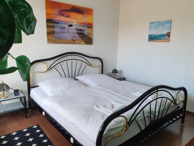 Ferienwohnung in Kühlungsborn - Haus Olymp - Elternschlafzimmer-Bett 180x200cm