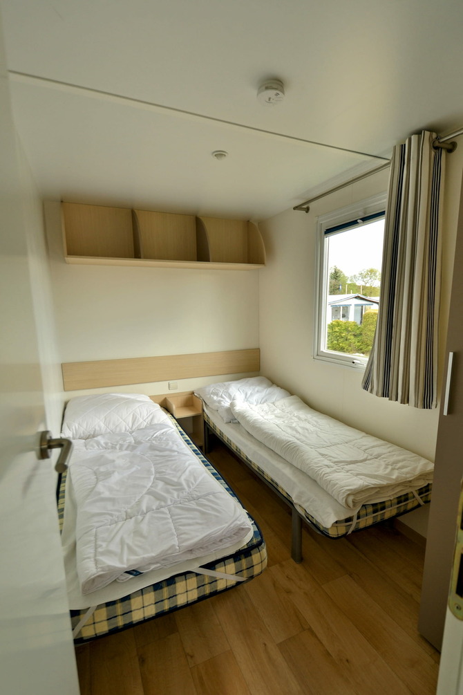 Ferienhaus in Pelzerhaken - Mobilheim Mediterranee - Schlafzimmer mit Einzelbetten