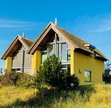 Ferienhaus in Heiligenhafen - Ostsee - Reetdachhaus Nr. 8 "Sonne und mehr" - mit Lademöglichkeit im Strand Resort - Bild 1