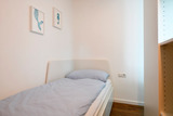 Ferienwohnung in Kellenhusen - Kirschgarten 17 - weiteres Bett hinter Raumteiler im Wohnbereich