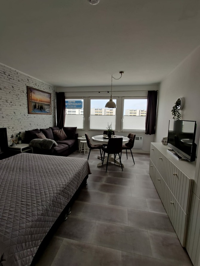 Appartement in Fehmarn OT Burgtiefe - Kleine Oase I - Wohnraum mit Schlaf-Sofa und Ess-Tisch