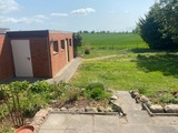 Ferienhaus in Fehmarn OT Gammendorf - Ferienhaus Sonnenwinkel - Blick in den Garten