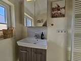 Ferienwohnung in Dahme - K&uuml;stengl&uuml;ck 3: Modernes Maisonette-Apartment mit Meerblick & Kickerspa&szlig; - 200m zum Strand & B&auml;cker. - Bild 19