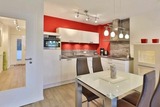 Ferienwohnung in Scharbeutz - Sommerlounge - Bild 1