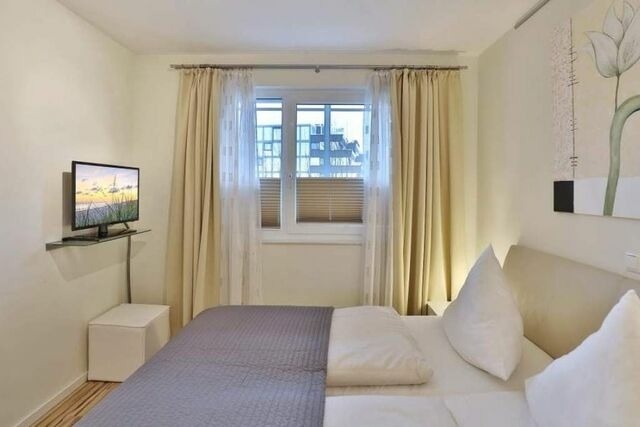 Ferienwohnung in Scharbeutz - Sommerlounge - Bild 11
